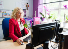 Corrienne at desk