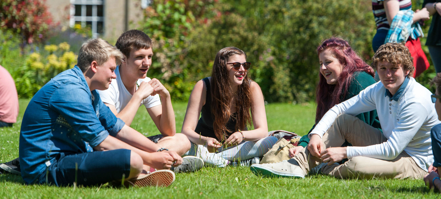 Paston students chatting on campus lawns
