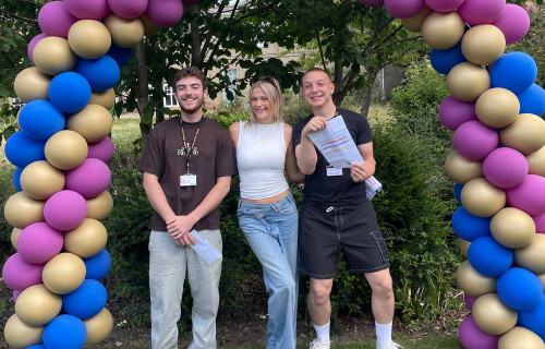Paston College students James, Ella and Rokas collecting their T Level results  2
