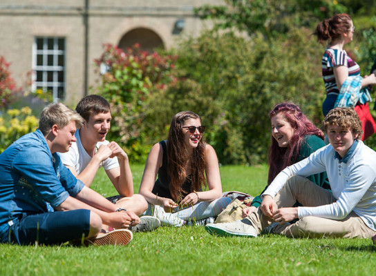Paston students chatting on campus lawns